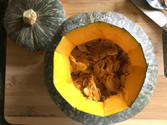 A large kabocha squash with the top removed.