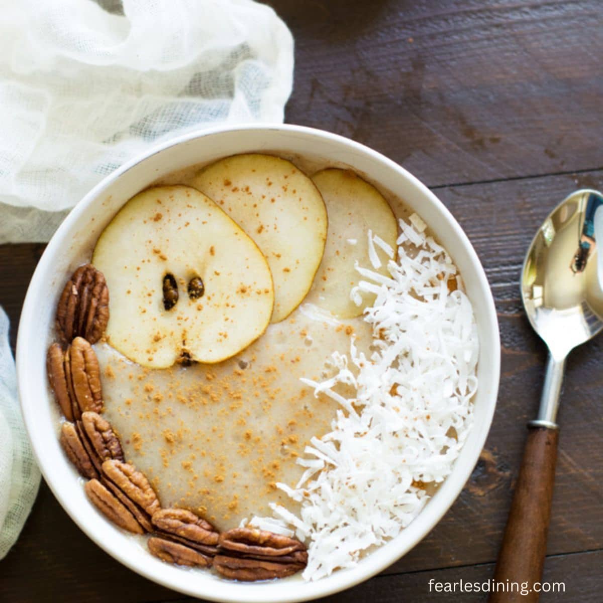 The top view of a homemade pear smoothie bowl.