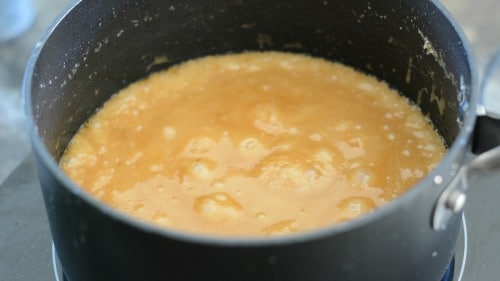Cooking toffee in a sauce pan to a golden color