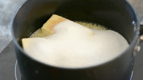 The butter and sugar melting in a sauce pan.