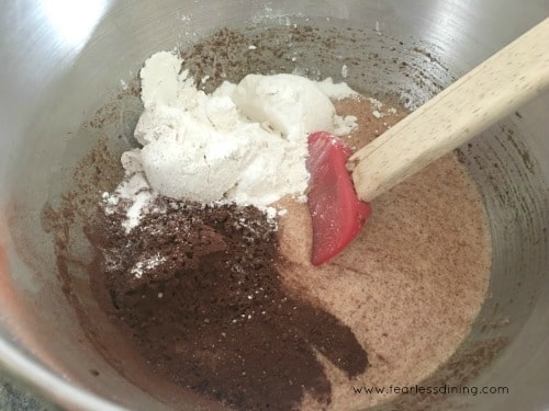 Adding gluten free flour and cocoa.