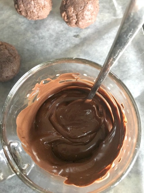 Melted chocolate in a glass dish.