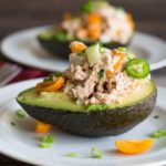 A tuna salad stuffed avocado half.