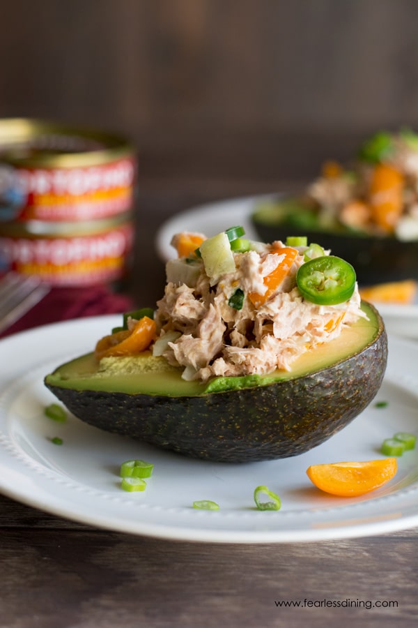 A tuna stuffed half of an avocado.