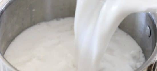 pouring milk into the rice