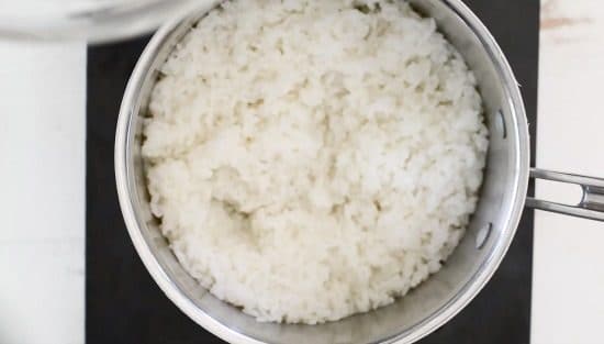 a pot of cooked white rice