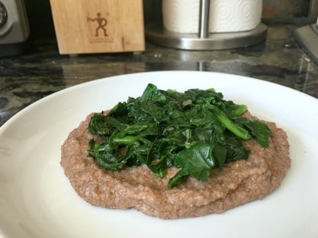 sauteed spinach on teff cheese grits