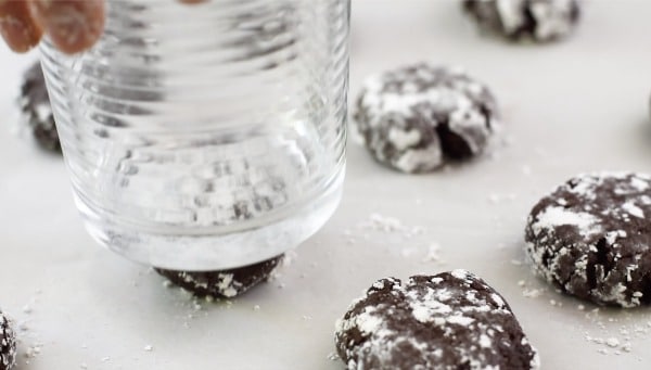 use a glass to smoosh the cookies flat