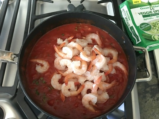 Cooked shrimp added to the simmering fra diavolo sauce.