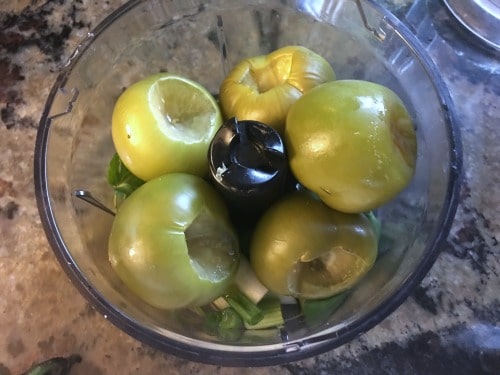 roasted tomatillos in a cusinart