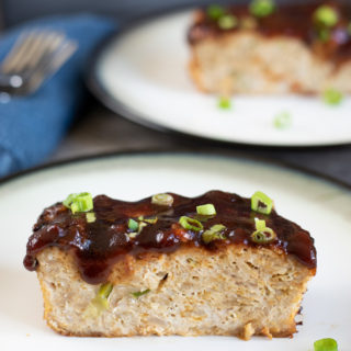 a slice of BBQ meatloaf on a plate