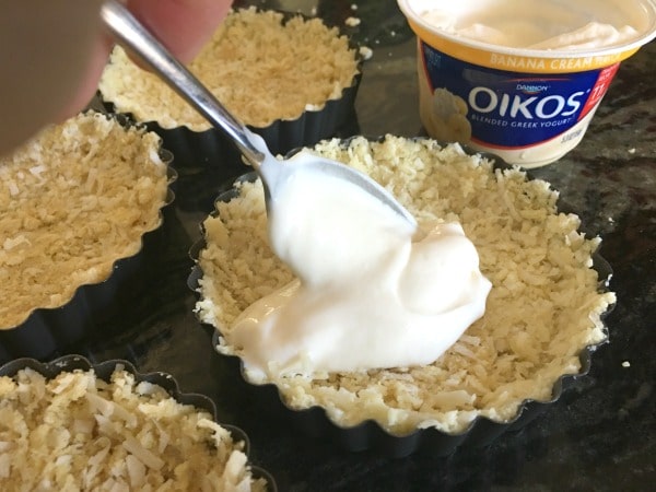 adding greek yogurt to the tart crust