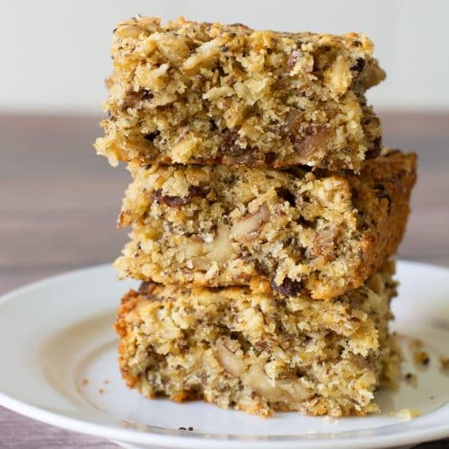 A stack of three gluten-free breakfast bars on a plate.