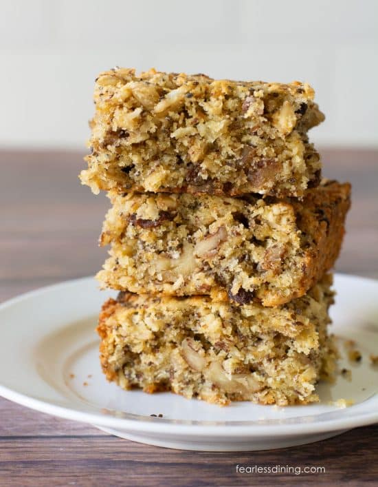 A stack of three gluten-free breakfast bars on a plate.
