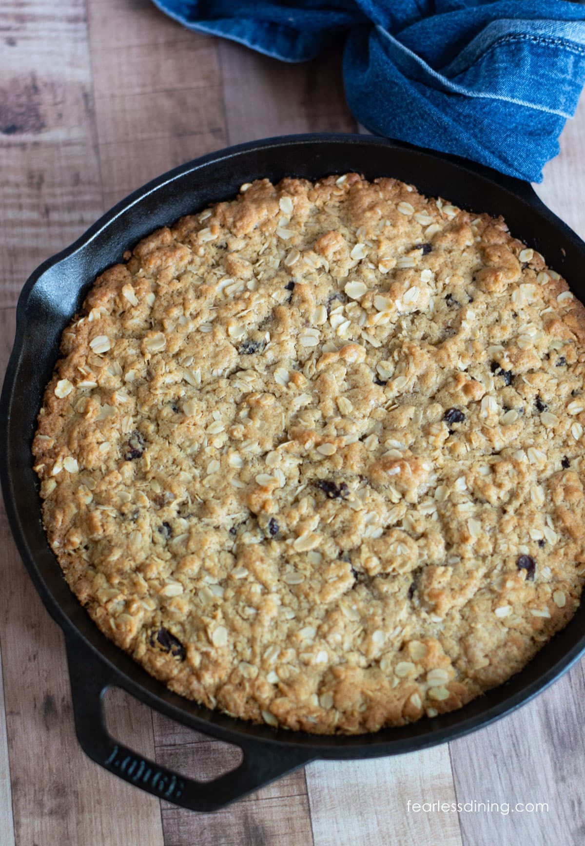 The baked gluten-free oatmeal skillet cookie in the skillet.