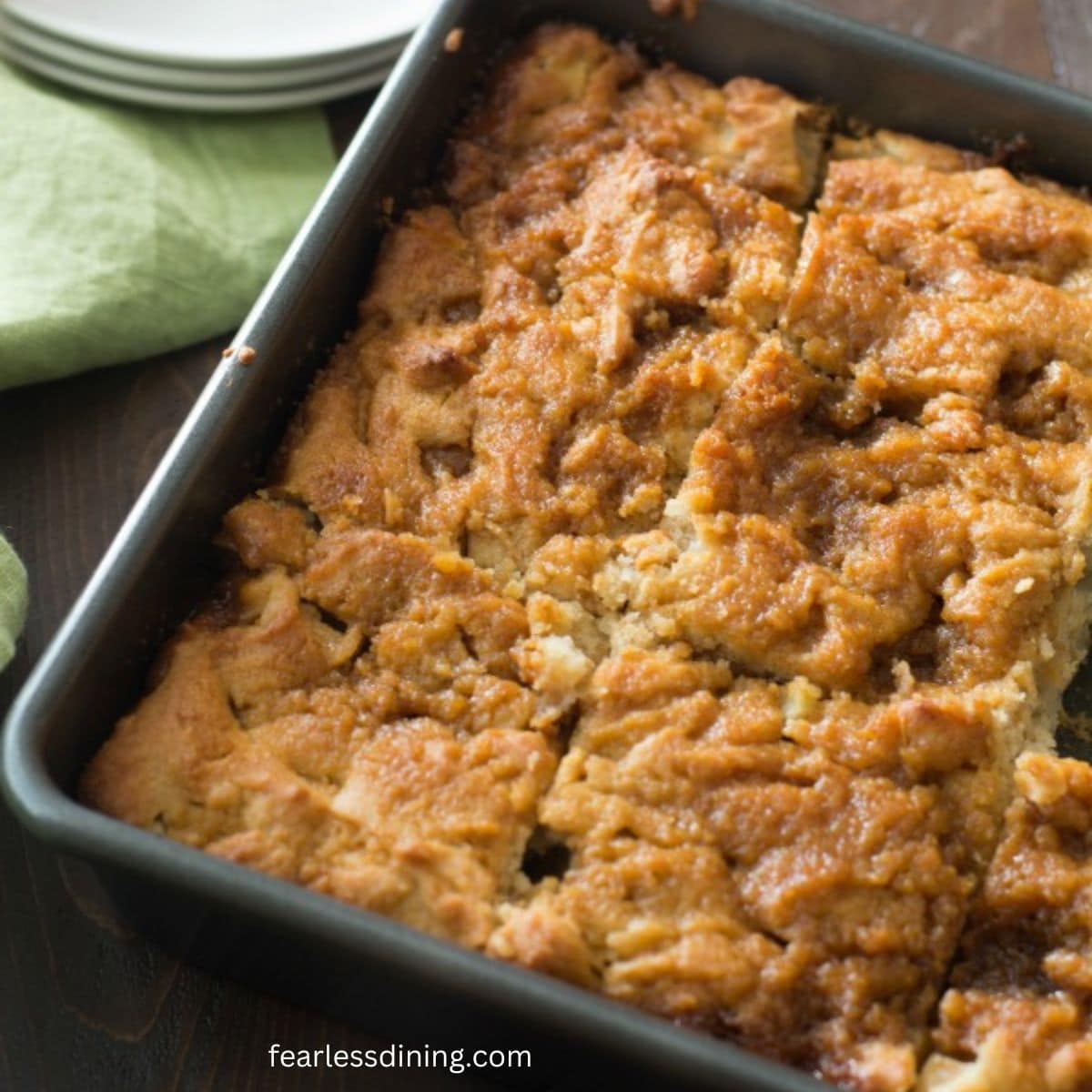 The baked caramel apple cake in the pan.