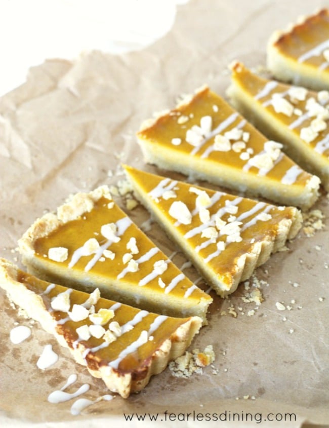 A sliced gluten free butternut squash tart.