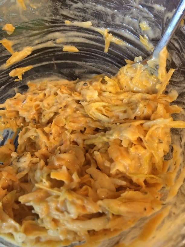 Shredded squash in a bowl.