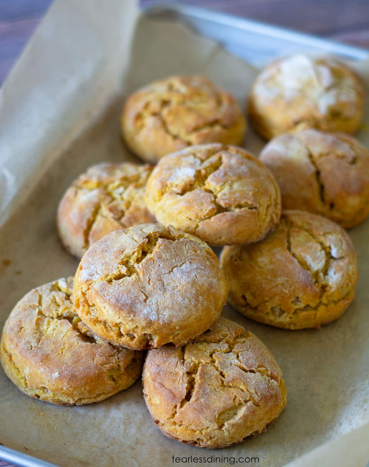 A bunch of gluten-free sweet potato scones on the baking tray.