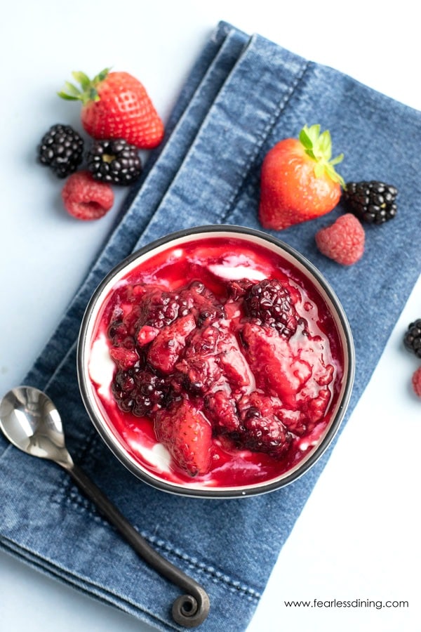 Mixed berry compote over plain yogurt.
