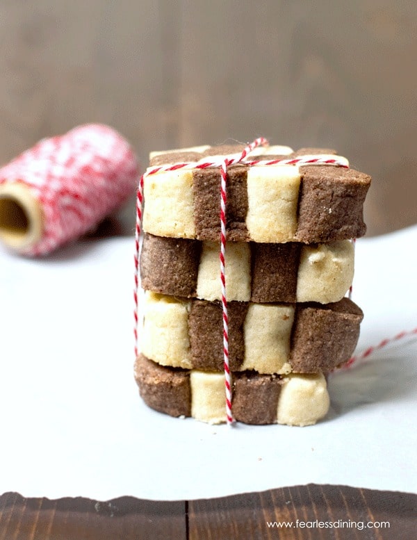 a stack of Czech black and white cookies tied with red and white baker's twine
