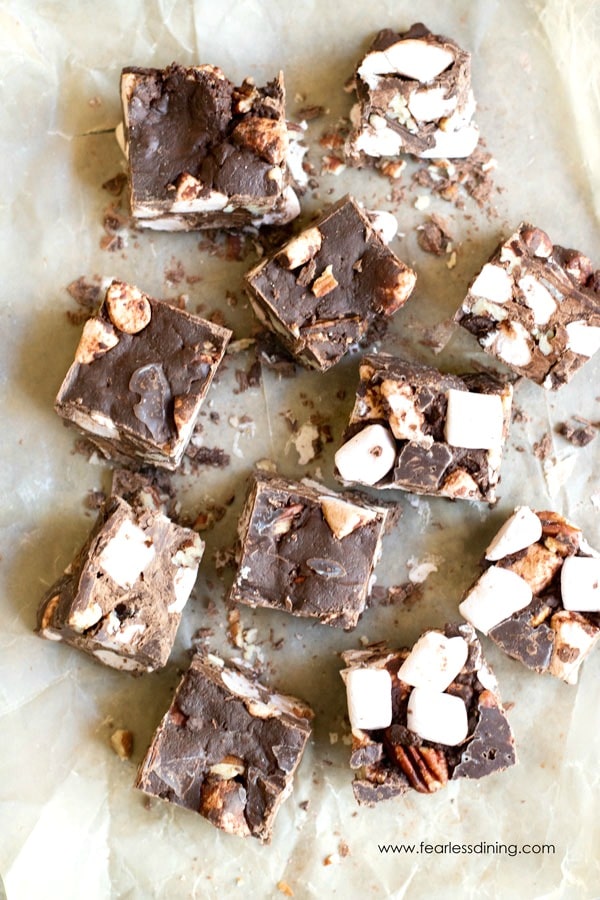 The top view of cut rocky road fudge on wax paper.