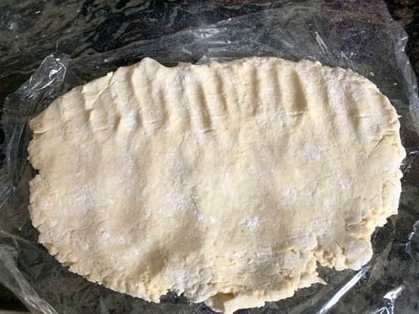 The dough rolled out ready to add butter.