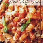 A Pinterest pin image of the pasta sauce over penne pasta noodles.