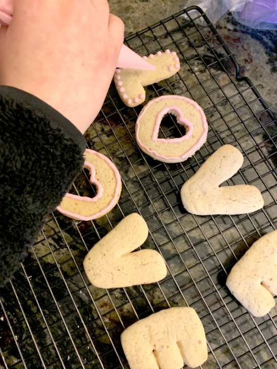 adding icing dots to a cookie