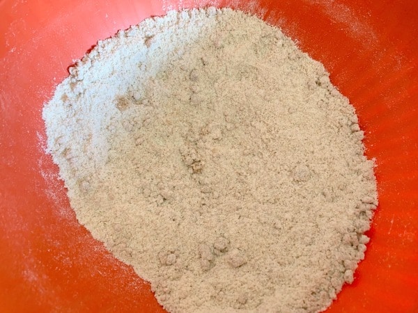 A bowl with the caramel cupcakes dry ingredients.