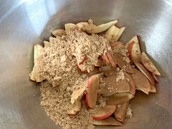 The crumble topping mixed with the apples.