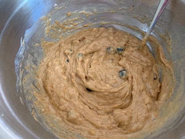 The blueberry protein muffin batter in a bowl.