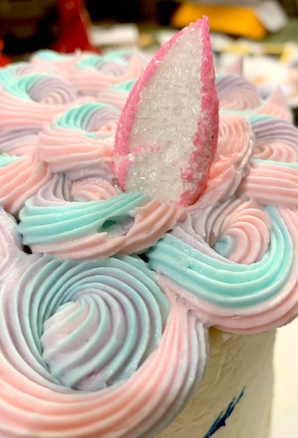 A pink Peep Easter candy cut in half in the shape of a horses ear.