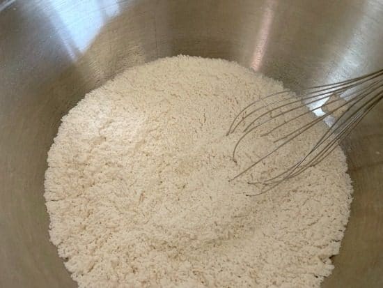 dry ingredients in a bowl with a whisk.
