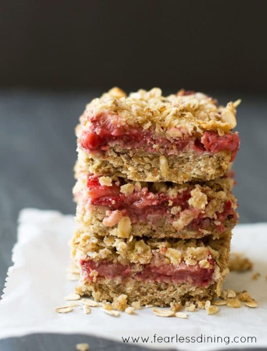 A stack of three gluten free strawberry oatmeal bars.