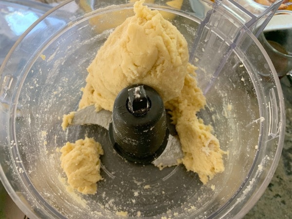 Grain-free biscuit dough in food processor.