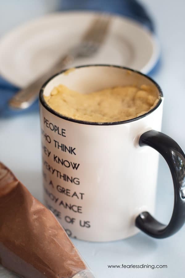 A gluten free vanilla mug cake in a mug.