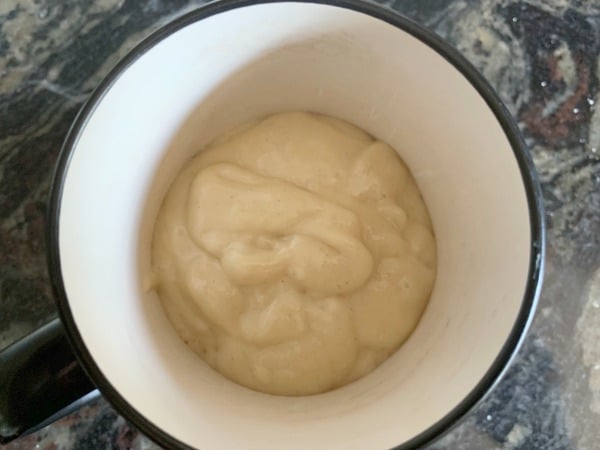 Mug cake batter in a mug.