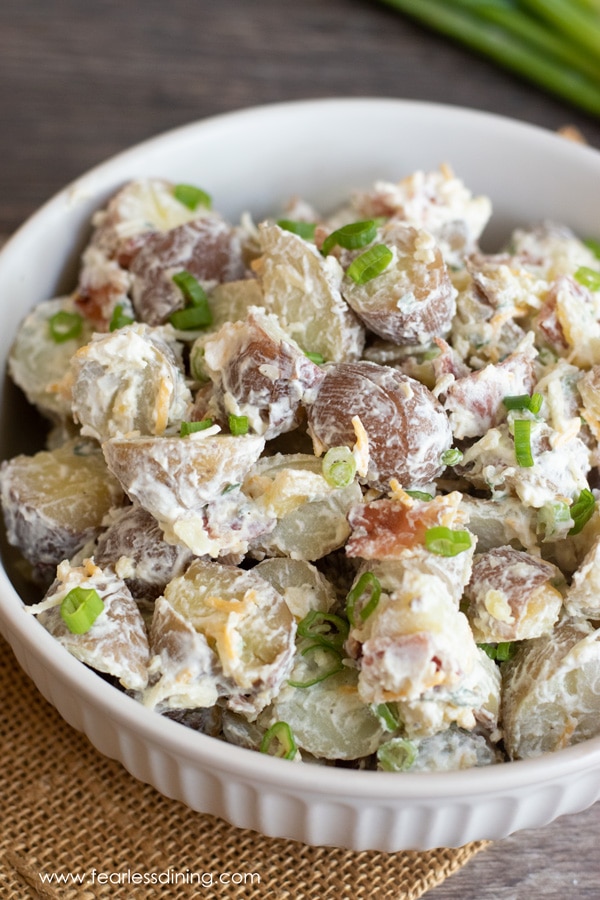 A close up of a bowl of gluten free potato salad.