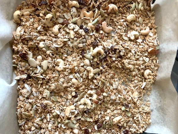 The baked granola on a cookie sheet.