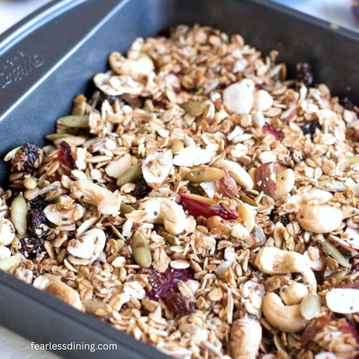The baked plum crisp in a pan.