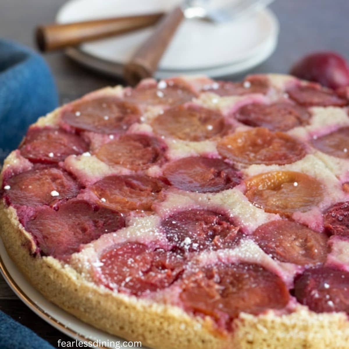 A photo of the original plum upside down cake with small plums from my tree.