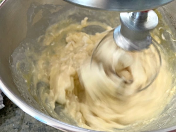Whipping up the cheesecake in a stand mixer.