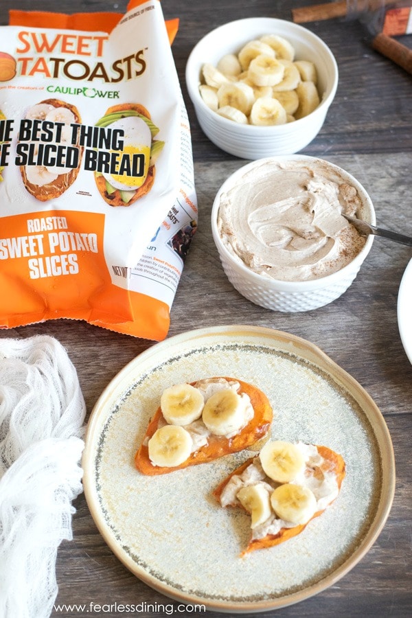 The top view of sweet potato toast topped with cinnamon cream cheese and sliced bananas.