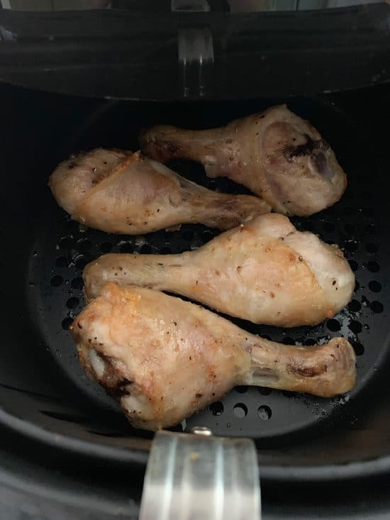 Cooked chicken drumsticks in the air fryer.