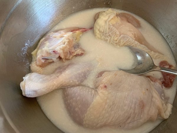 chicken soaking in buttermilk
