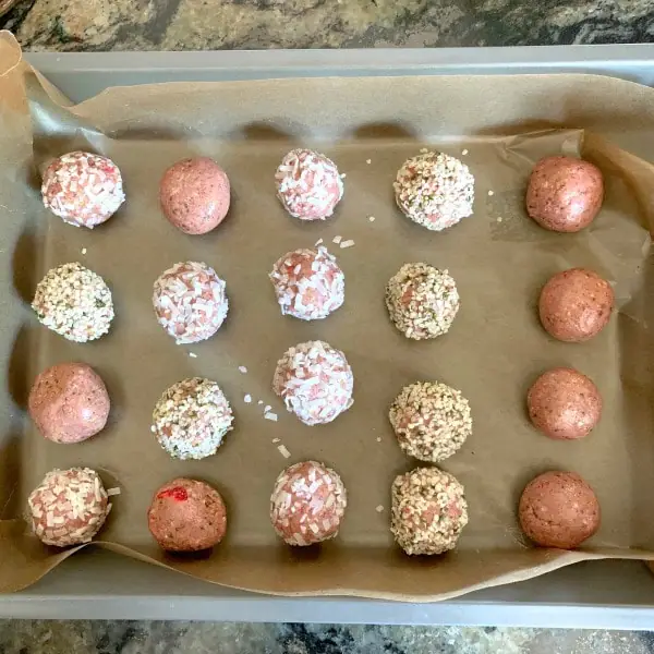 gluten free energy balls ready to chill on a tray