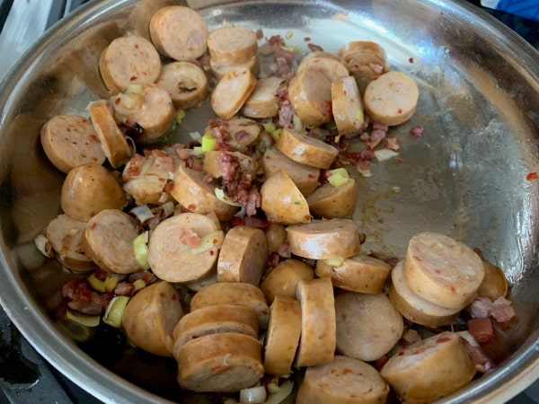 Sausage cooking with the leeks and pancetta.