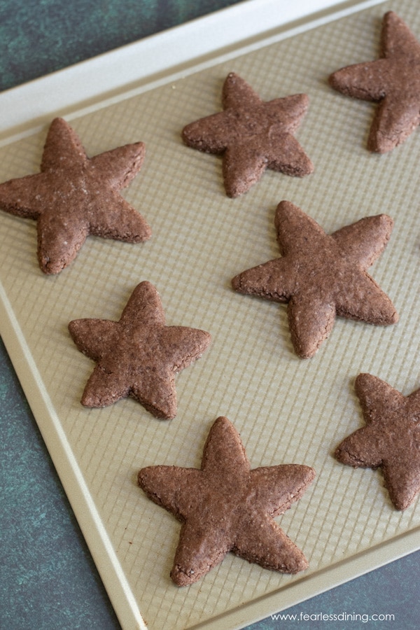 The baked Swiss brunsli cookies on a cookie sheet.