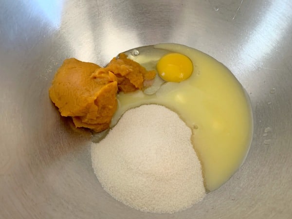 The pumpkin biscotti wet ingredients in a bowl.